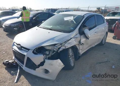 2014 Ford Focus Titanium from USA, damaged, VIN 1FADP3N25EL264660